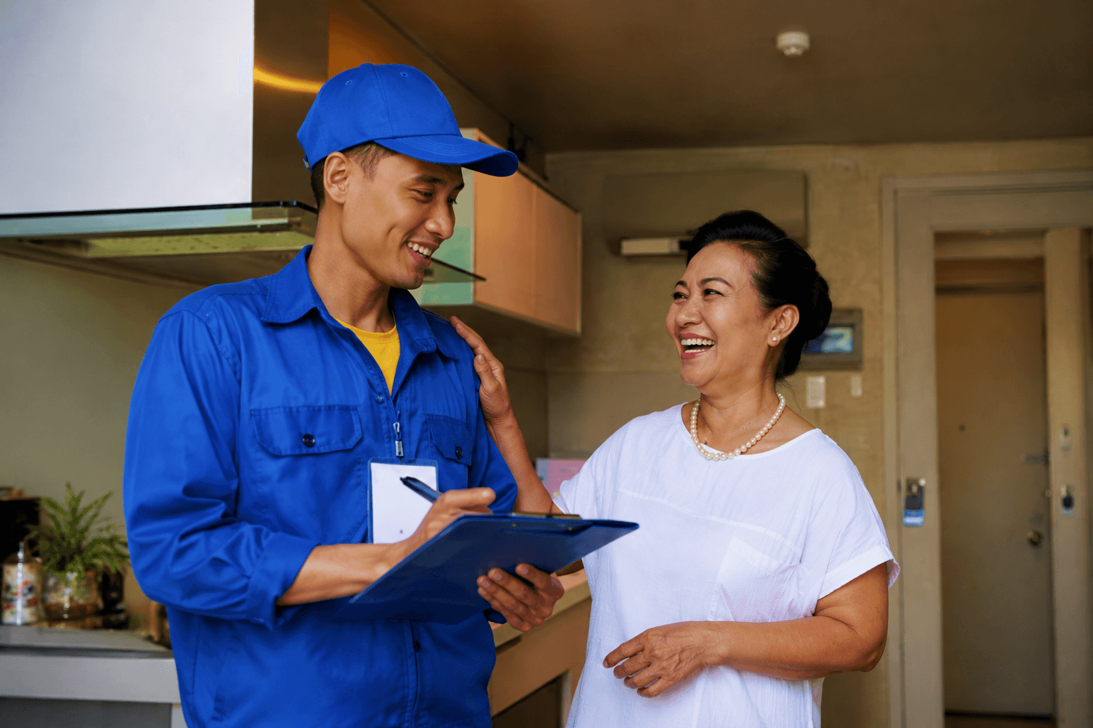 A friendly technician arriving at a customer's door